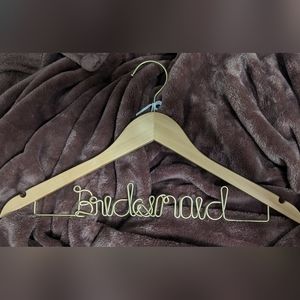 bridesmaid hanger for wedding or gift details shot wooden